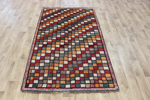 Vintage handmade Persian tribal rug with an all over checked design 175 x 105 cm