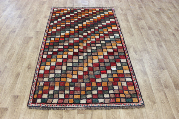Vintage handmade Persian tribal rug with an all over checked design 175 x 105 cm