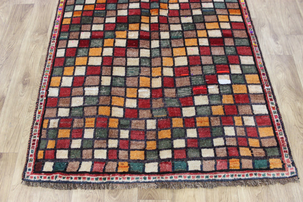 Vintage handmade Persian tribal rug with an all over checked design 175 x 105 cm