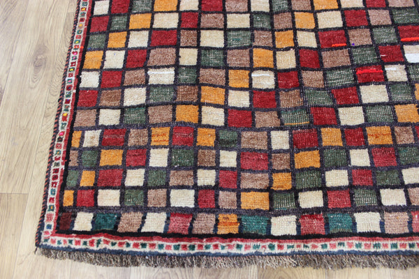 Vintage handmade Persian tribal rug with an all over checked design 175 x 105 cm