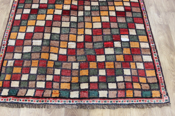 Vintage handmade Persian tribal rug with an all over checked design 175 x 105 cm