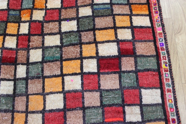 Vintage handmade Persian tribal rug with an all over checked design 175 x 105 cm