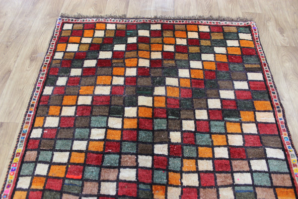 Vintage handmade Persian tribal rug with an all over checked design 175 x 105 cm