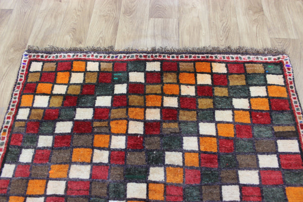 Vintage handmade Persian tribal rug with an all over checked design 175 x 105 cm