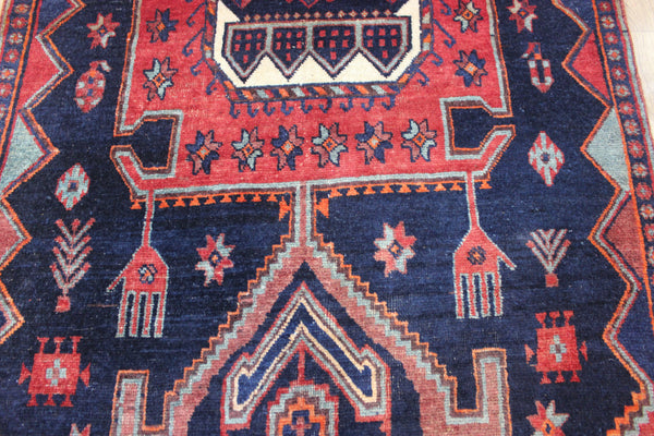 Old handmade Persian Hamadan region runner of traditional medallion design. Dated to the field 1349 (1976).