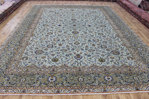 Large handmade Persian kashan carpet, of superb classic floral design395 x 301 cm