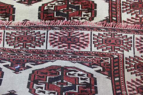 Antique Bokhara tribal rug of traditional gul design 176 x 100 cm