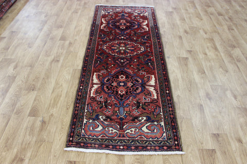 Persian Heriz runner of traditional medallion design 210 x 82 cm
