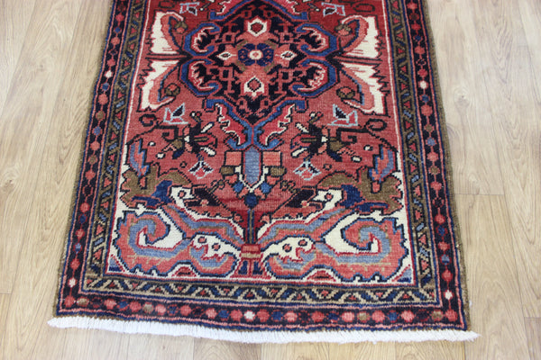 Persian Heriz runner of traditional medallion design 210 x 82 cm