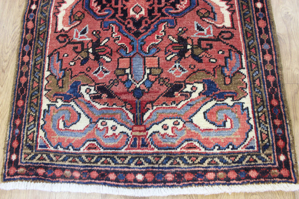 Persian Heriz runner of traditional medallion design 210 x 82 cm