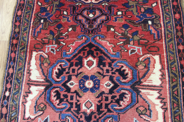 Persian Heriz runner of traditional medallion design 210 x 82 cm