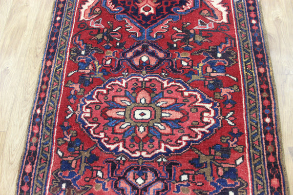 Persian Heriz runner of traditional medallion design 210 x 82 cm