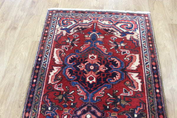 Persian Heriz runner of traditional medallion design 210 x 82 cm