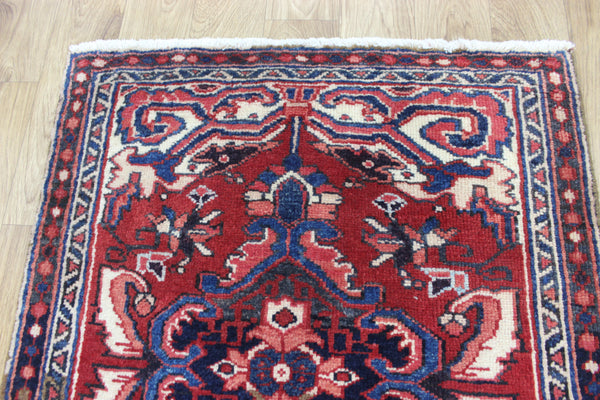 Persian Heriz runner of traditional medallion design 210 x 82 cm