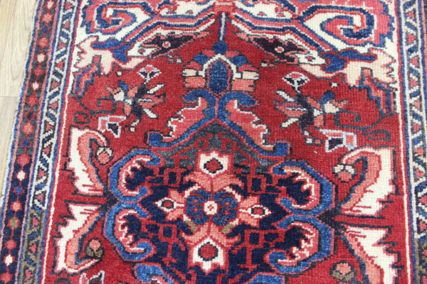Persian Heriz runner of traditional medallion design 210 x 82 cm