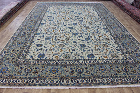 Signed Persian keshan carpet, of superb classic floral design with outstanding colours 443 x 294 cm