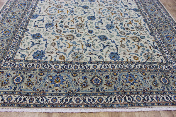 Signed Persian keshan carpet, of superb classic floral design with outstanding colours 443 x 294 cm