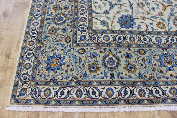 Signed Persian keshan carpet, of superb classic floral design with outstanding colours 443 x 294 cm