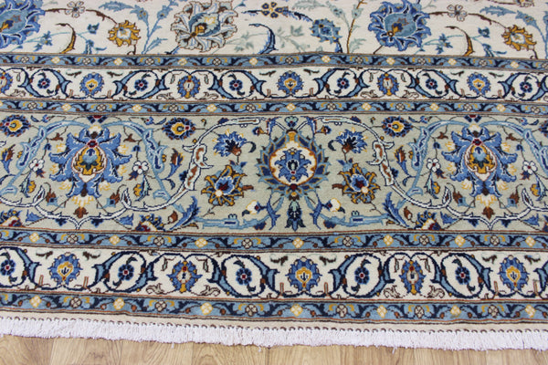 Signed Persian keshan carpet, of superb classic floral design with outstanding colours 443 x 294 cm