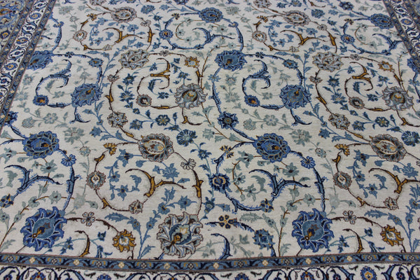 Signed Persian keshan carpet, of superb classic floral design with outstanding colours 443 x 294 cm