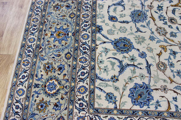 Signed Persian keshan carpet, of superb classic floral design with outstanding colours 443 x 294 cm