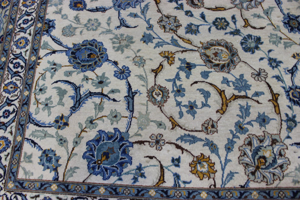 Signed Persian keshan carpet, of superb classic floral design with outstanding colours 443 x 294 cm