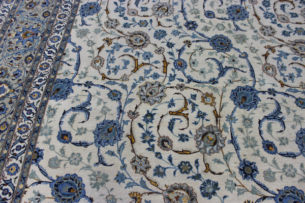 Signed Persian keshan carpet, of superb classic floral design with outstanding colours 443 x 294 cm