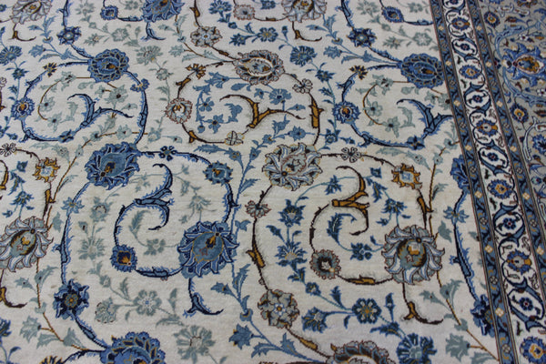 Signed Persian keshan carpet, of superb classic floral design with outstanding colours 443 x 294 cm