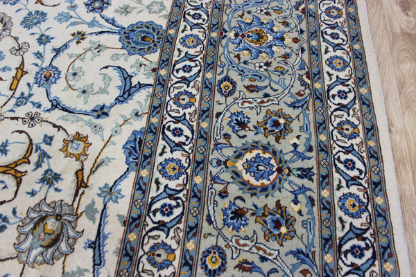 Signed Persian keshan carpet, of superb classic floral design with outstanding colours 443 x 294 cm