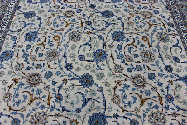 Signed Persian keshan carpet, of superb classic floral design with outstanding colours 443 x 294 cm