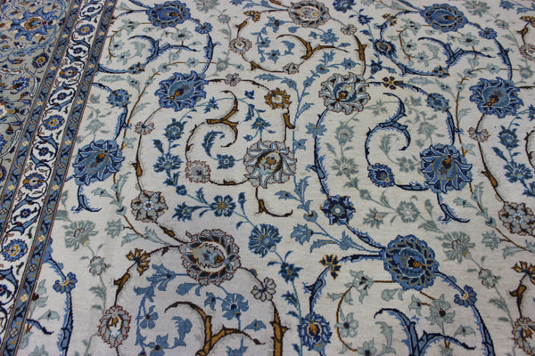 Signed Persian keshan carpet, of superb classic floral design with outstanding colours 443 x 294 cm