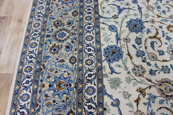 Signed Persian keshan carpet, of superb classic floral design with outstanding colours 443 x 294 cm