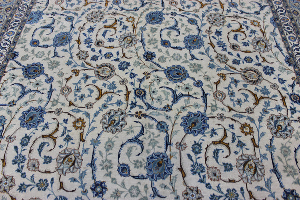 Signed Persian keshan carpet, of superb classic floral design with outstanding colours 443 x 294 cm