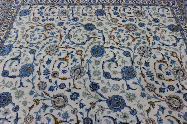 Signed Persian keshan carpet, of superb classic floral design with outstanding colours 443 x 294 cm