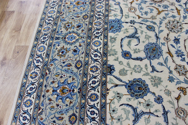 Signed Persian keshan carpet, of superb classic floral design with outstanding colours 443 x 294 cm