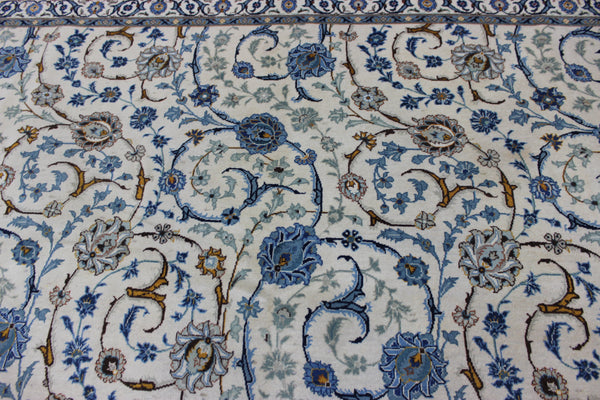 Signed Persian keshan carpet, of superb classic floral design with outstanding colours 443 x 294 cm