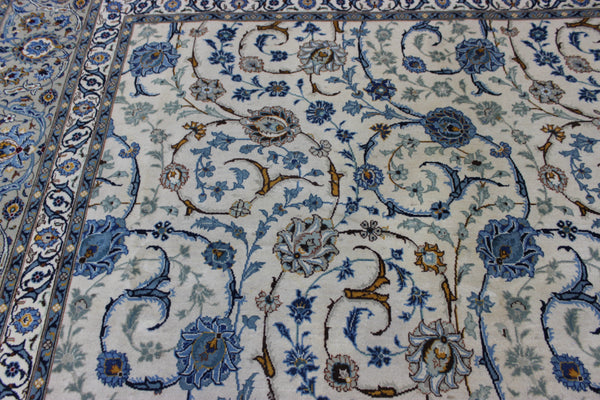 Signed Persian keshan carpet, of superb classic floral design with outstanding colours 443 x 294 cm