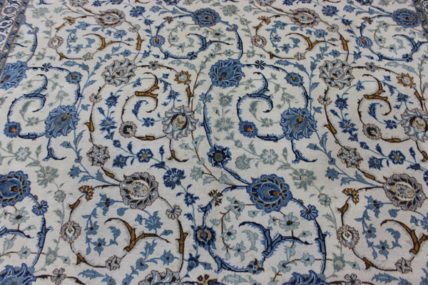 Signed Persian keshan carpet, of superb classic floral design with outstanding colours 443 x 294 cm