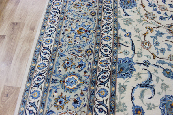 Signed Persian keshan carpet, of superb classic floral design with outstanding colours 443 x 294 cm