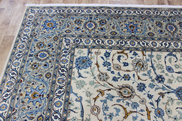 Signed Persian keshan carpet, of superb classic floral design with outstanding colours 443 x 294 cm