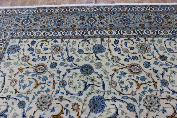 Signed Persian keshan carpet, of superb classic floral design with outstanding colours 443 x 294 cm