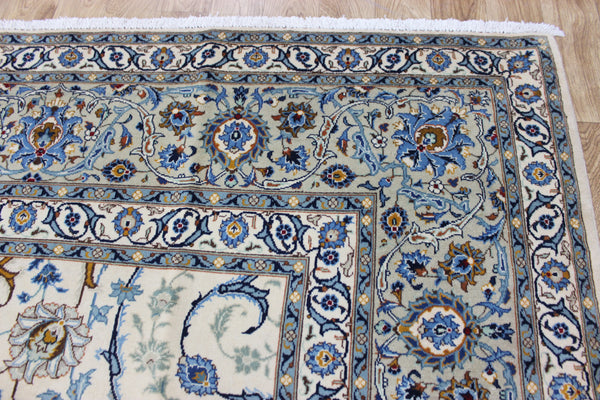 Signed Persian keshan carpet, of superb classic floral design with outstanding colours 443 x 294 cm