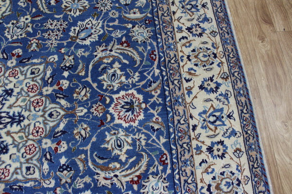 Persian Nain Wool & Silk Rug 255 × 170 cm – Handmade Blue Floral Carpet