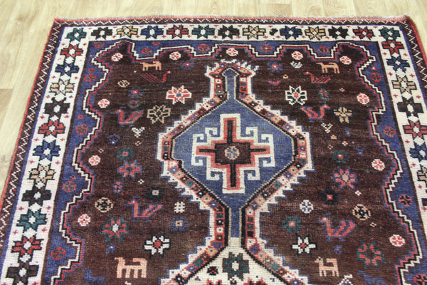 Vintage Persian Qashqai Shiraz Rug 200 × 140 cm – Brown Field Triple Medallion Tribal Design