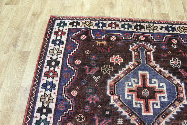 Vintage Persian Qashqai Shiraz Rug 200 × 140 cm – Brown Field Triple Medallion Tribal Design