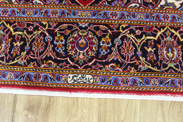 A VERY FINE HANDMADE KASHAN RUG SIGNED BY THE MAKER 230 X 145 CM