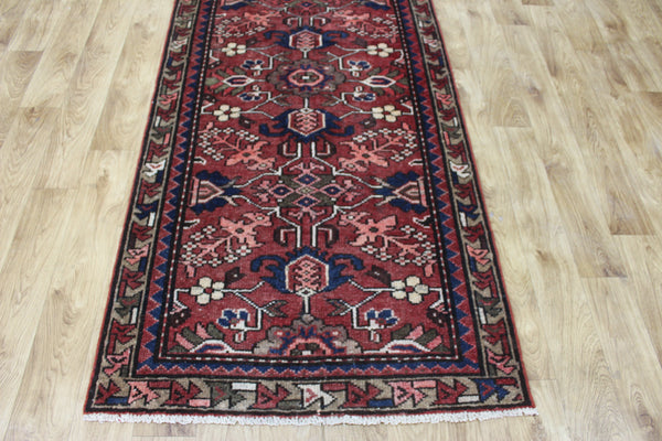 Antique Persian Heriz runner of traditional floral design 278 x 92 cm