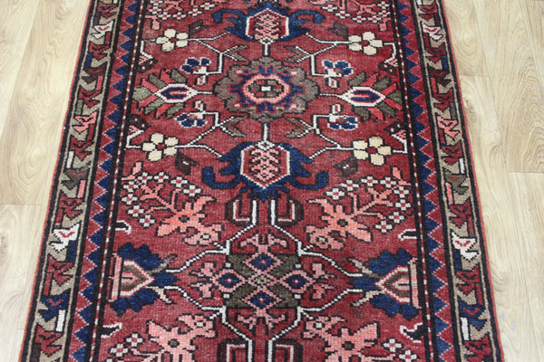 Antique Persian Heriz runner of traditional floral design 278 x 92 cm