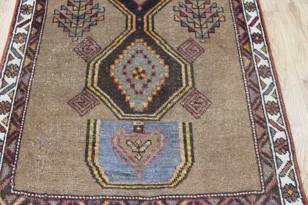 Antique Persian Heriz runner of traditional medallion design 390 x 95 cm