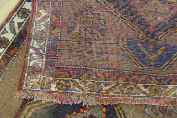 Antique Persian Heriz runner of traditional medallion design 390 x 95 cm